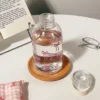 S3b9a0c9c6ebd45dda7099019663ca4d6h-1.webp Botella de Agua 400/600ml con Diseño Lazo para Mujeres - Werlivo