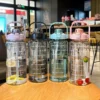 S9122b5972755478d8d9d34086d5baa52A.webp Botella de Agua 1L/2L Portátil con Sorbete para Deportes - Werlivo