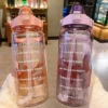S9c5bf1b01df94398a57a984e6f0a90467.webp Botella de Agua 1L/2L Portátil con Sorbete para Deportes - Werlivo